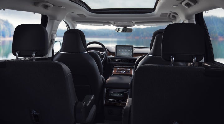 The interior of a 2024 Lincoln Aviator® SUV from behind the second row | Irwin Lincoln Laconia in Laconia NH
