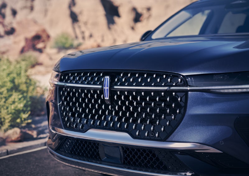 The stylish grille of a 2024 Lincoln Nautilus® SUV sparkles in the sunlight. | Irwin Lincoln Laconia in Laconia NH
