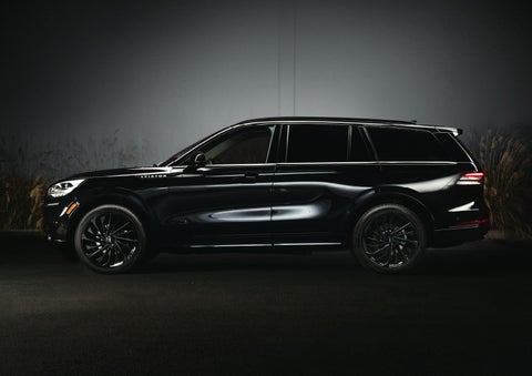 A 2024 Lincoln Aviator® SUV is shown in the Infinite Black exterior color | Irwin Lincoln Laconia in Laconia NH
