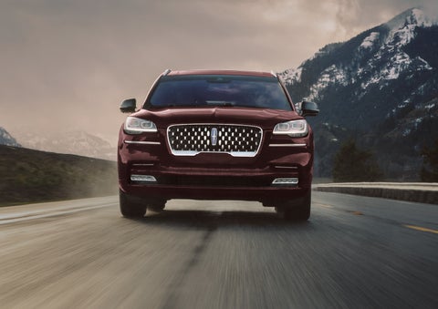 A 2024 Lincoln Aviator® SUV is shown in the Diamond Red exterior color. | Irwin Lincoln Laconia in Laconia NH