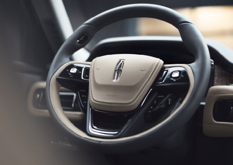The intuitively placed controls of the steering wheel on a 2024 Lincoln Aviator® SUV | Irwin Lincoln Laconia in Laconia NH