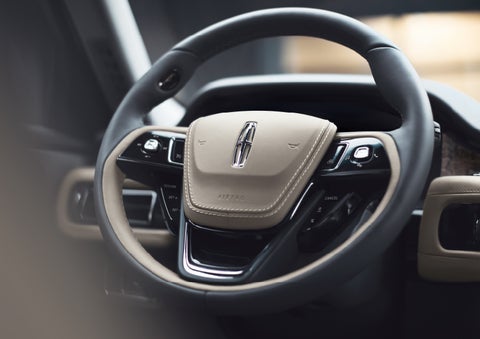 The intuitively placed controls of the steering wheel on a 2024 Lincoln Aviator® SUV | Irwin Lincoln Laconia in Laconia NH