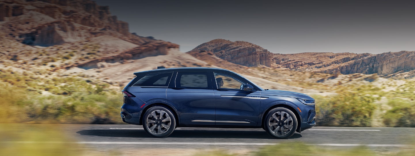 A 2024 Lincoln Nautilus® SUV is being driven in a desert setting. | Irwin Lincoln Laconia in Laconia NH