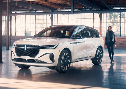 A person approaches a 2024 Lincoln Nautilus® SUV. | Irwin Lincoln Laconia in Laconia NH