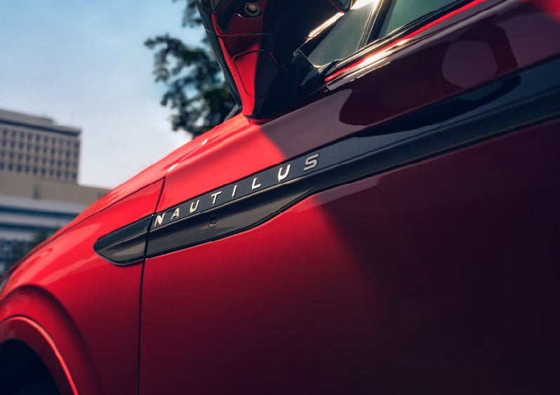 A side badge on the passenger door reads Nautilus. | Irwin Lincoln Laconia in Laconia NH