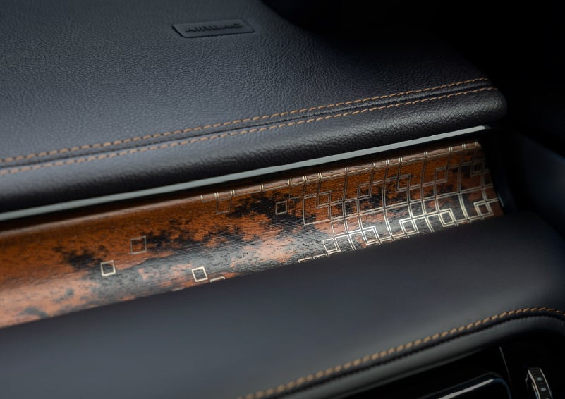 A close-up shot of the 2026 Lincoln Aviator® dashboard with unique black and brown accents and brown stitching. | Irwin Lincoln Laconia in Laconia NH