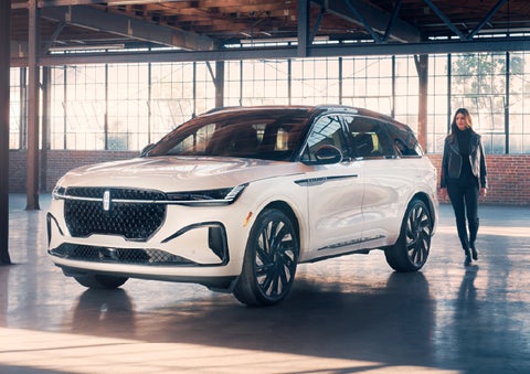 A person approaches a 2026 Lincoln Nautilus® SUV. | Irwin Lincoln Laconia in Laconia NH