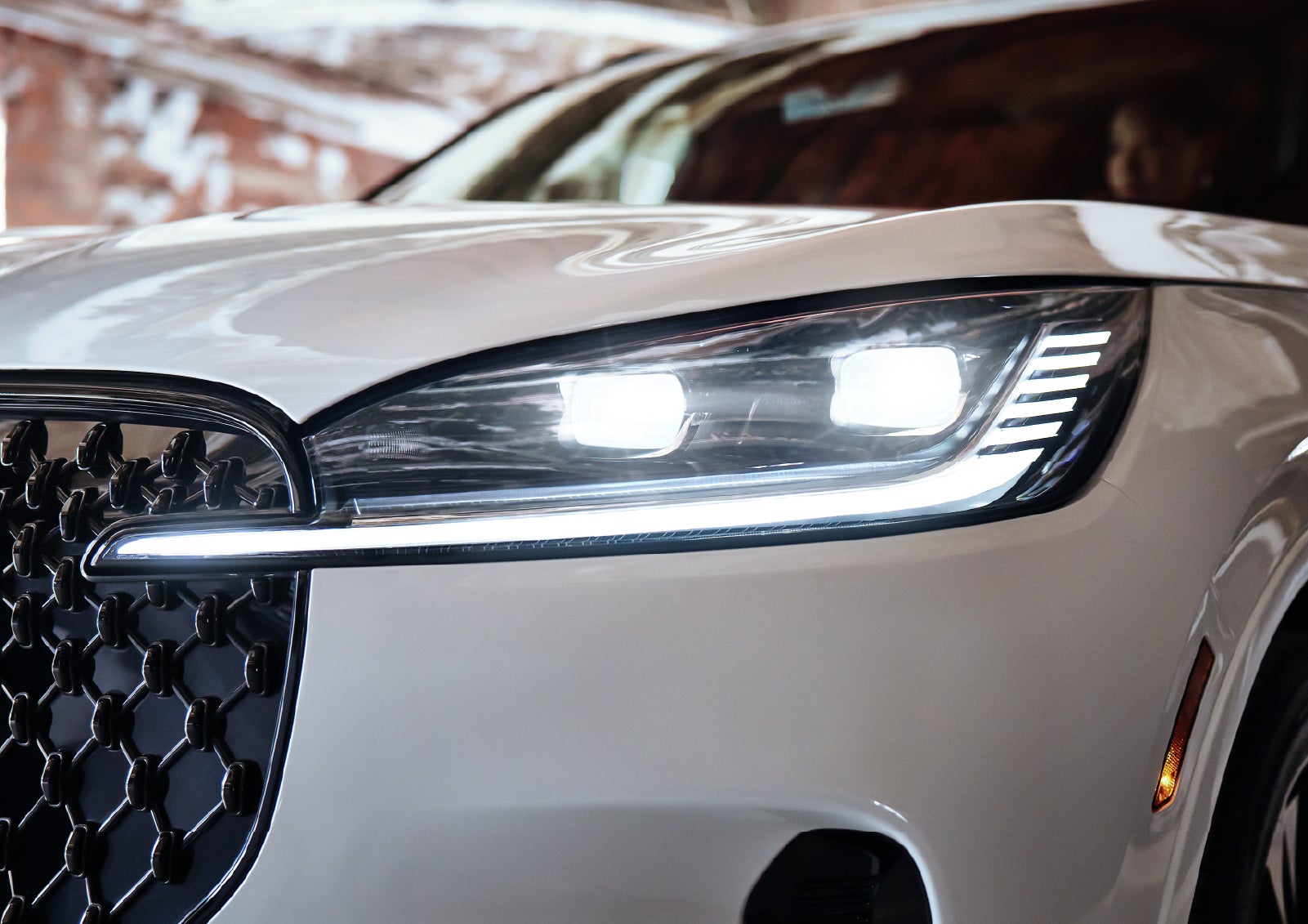 A close-up of a headlamp on the 2027 Lincoln Aviator® SUV is shown. | Irwin Lincoln Laconia in Laconia NH