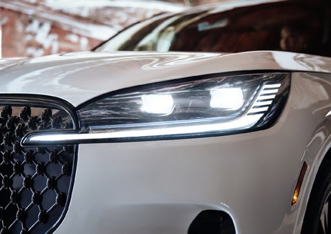 A close-up of a headlamp on the 2027 Lincoln Aviator® SUV is shown. | Irwin Lincoln Laconia in Laconia NH